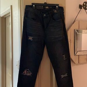 L&B black distressed jeans with leopard patches